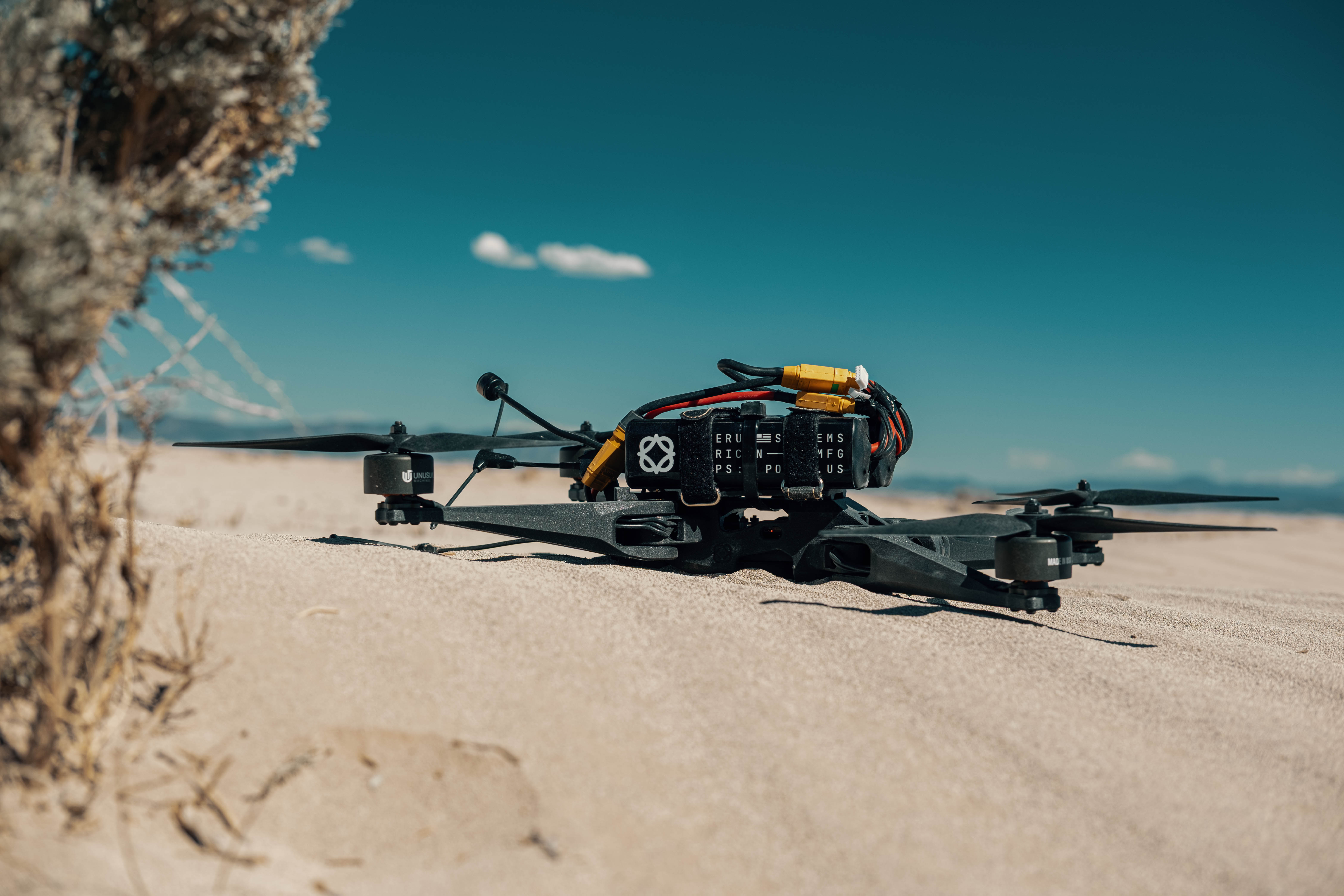 Matrix Fold staged on desert sand under open sky